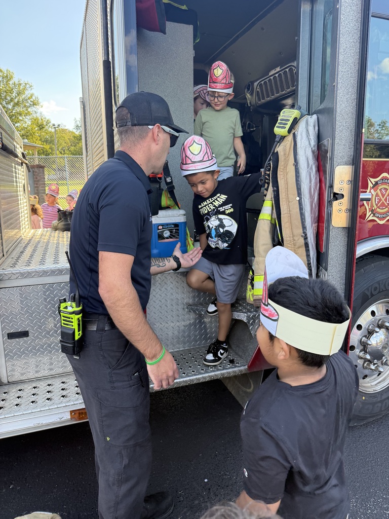 students on fire truck