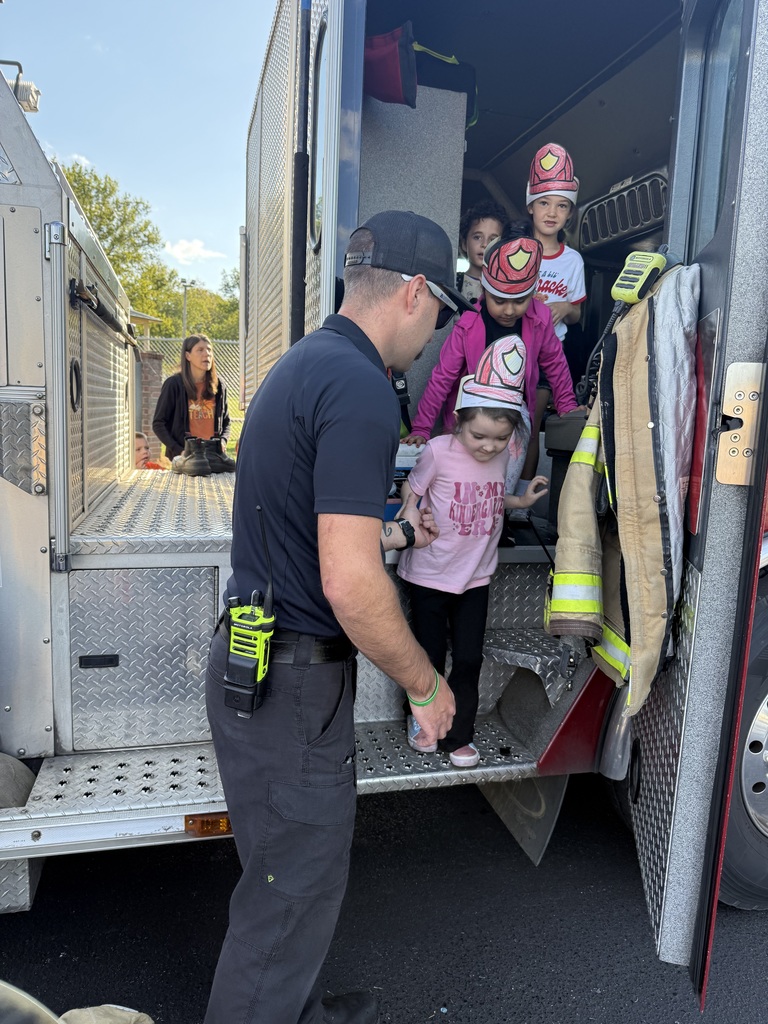 students on fire truck
