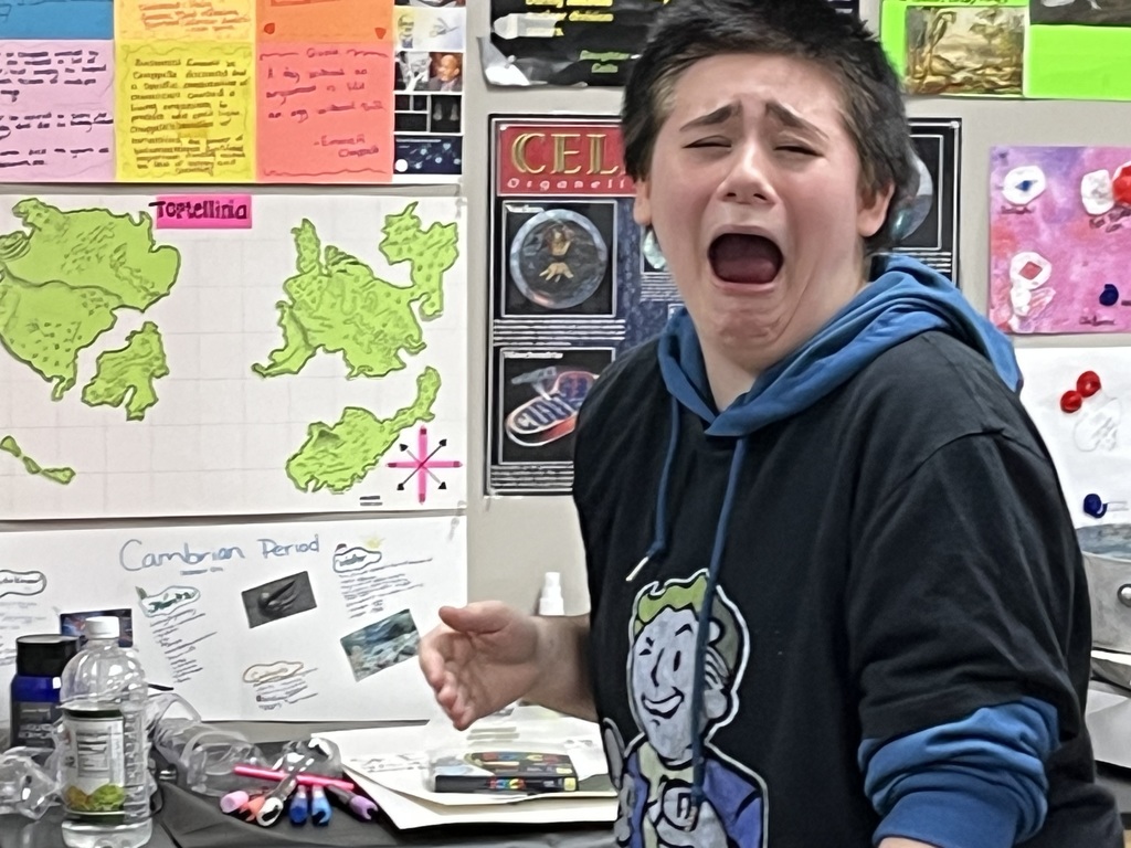 high school students doing a science experiment