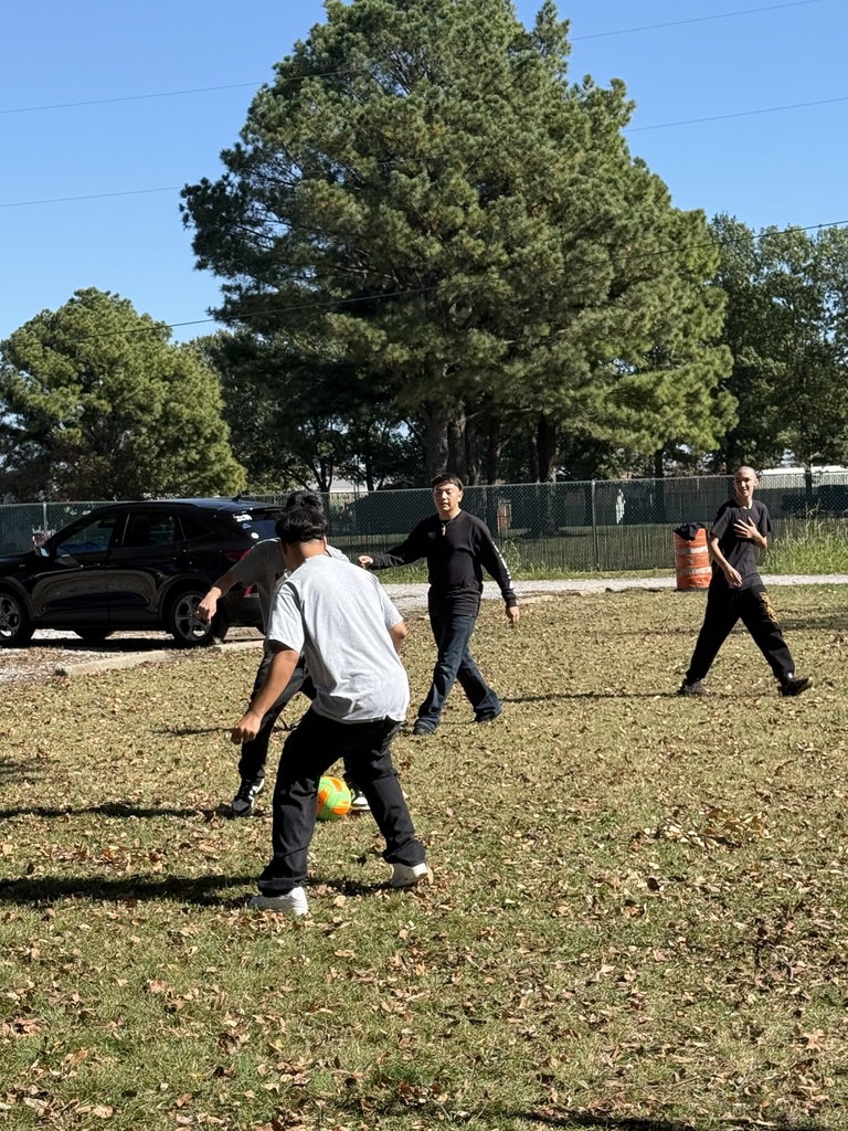 high school students playing soccer
