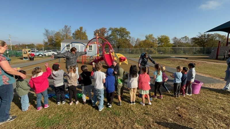 students throwing water balloons