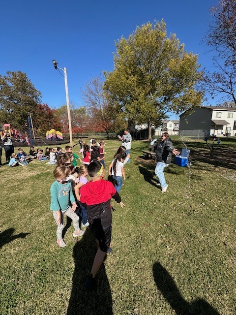 students throwing water balloons