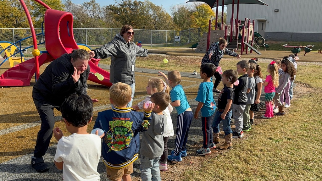 students throwing water balloons