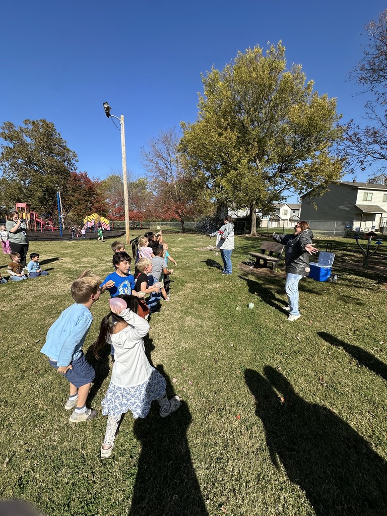 students throwing water balloons