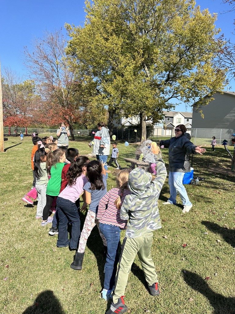 students throwing water balloons