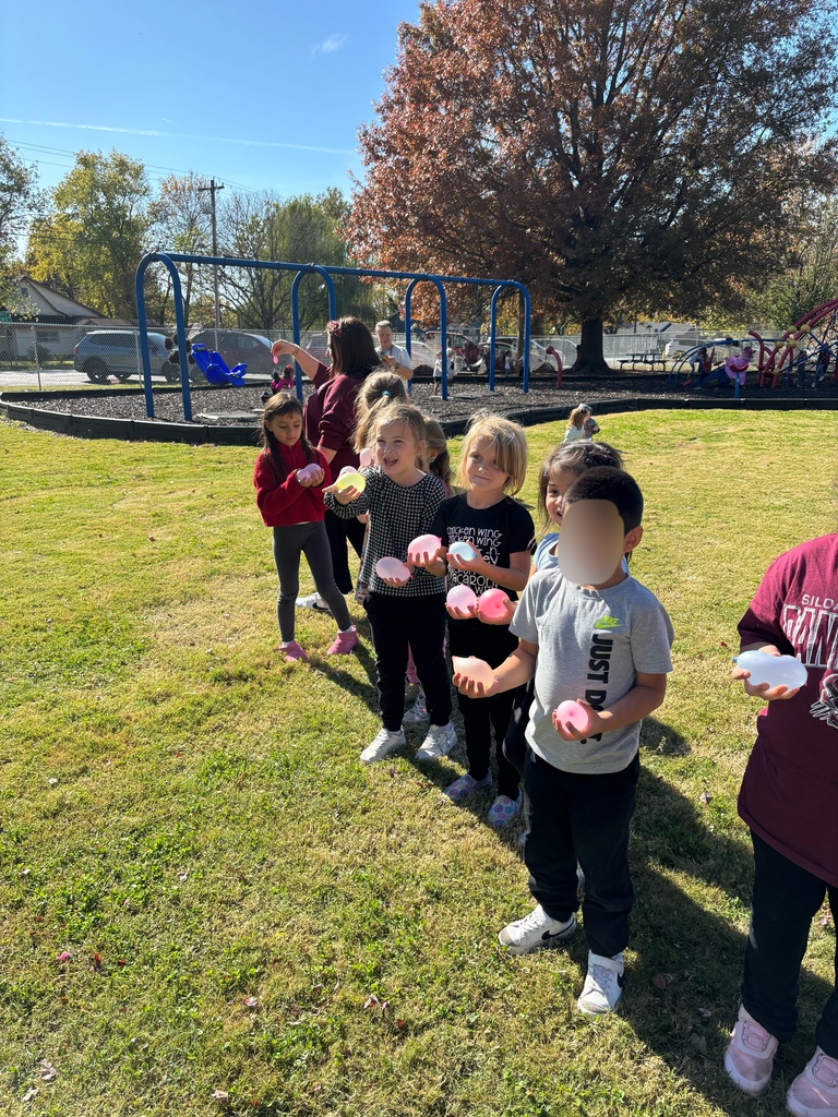 students throwing water balloons