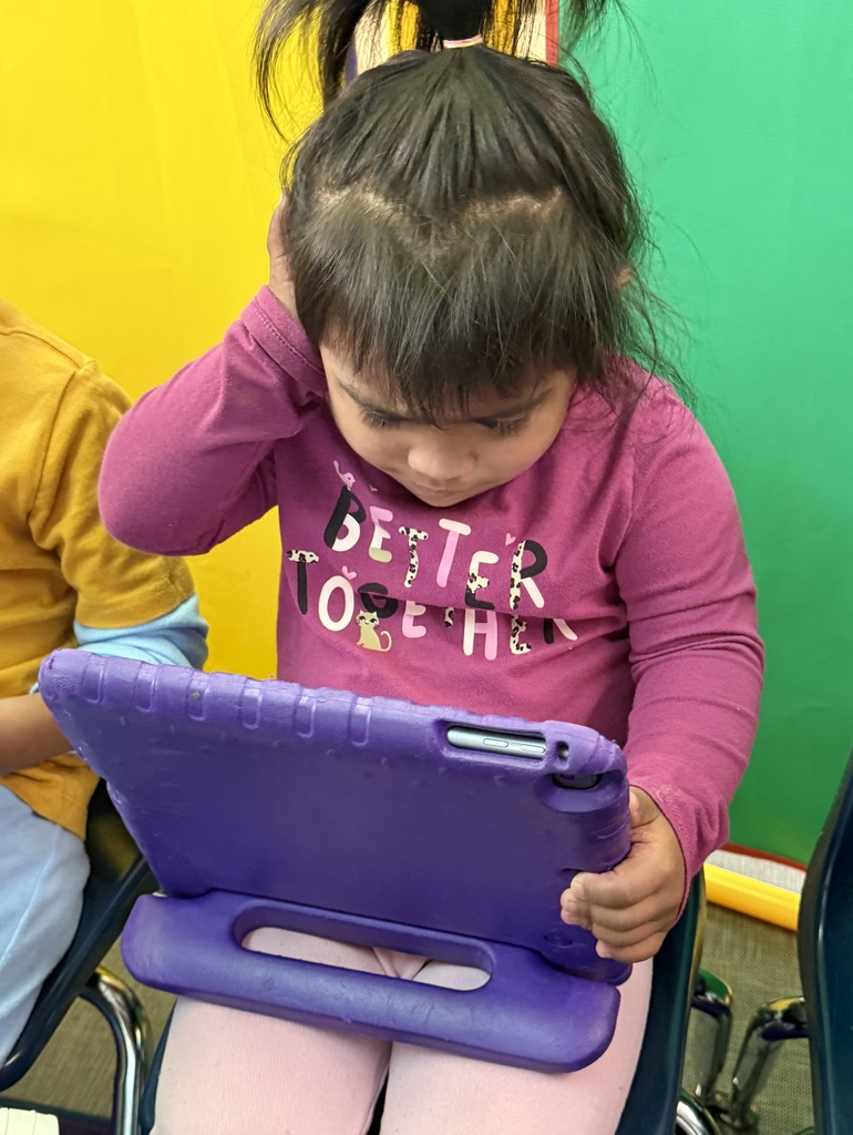 students learning on ipads