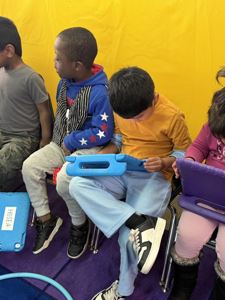 students learning on ipads