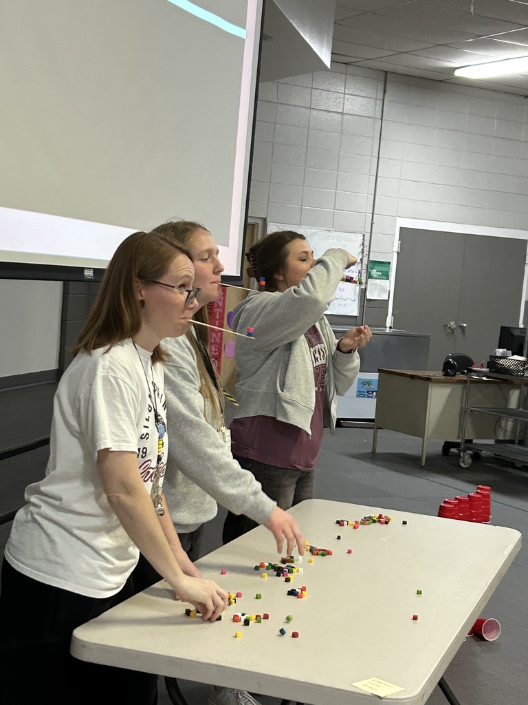 teachers stacking on a stick