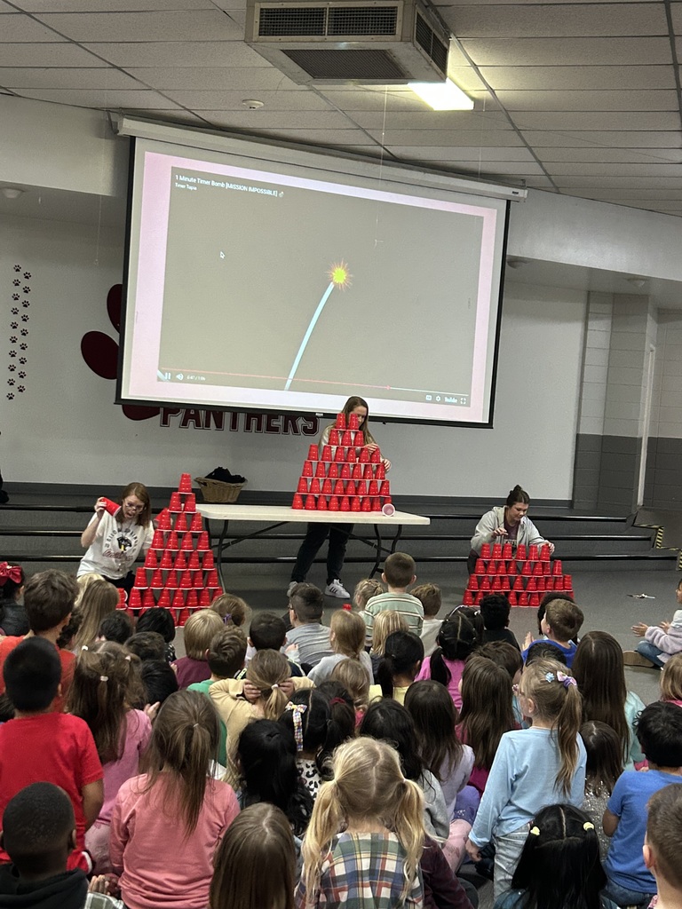 teachers stacking cups