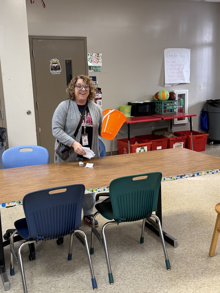 school principal leading a FriYay game