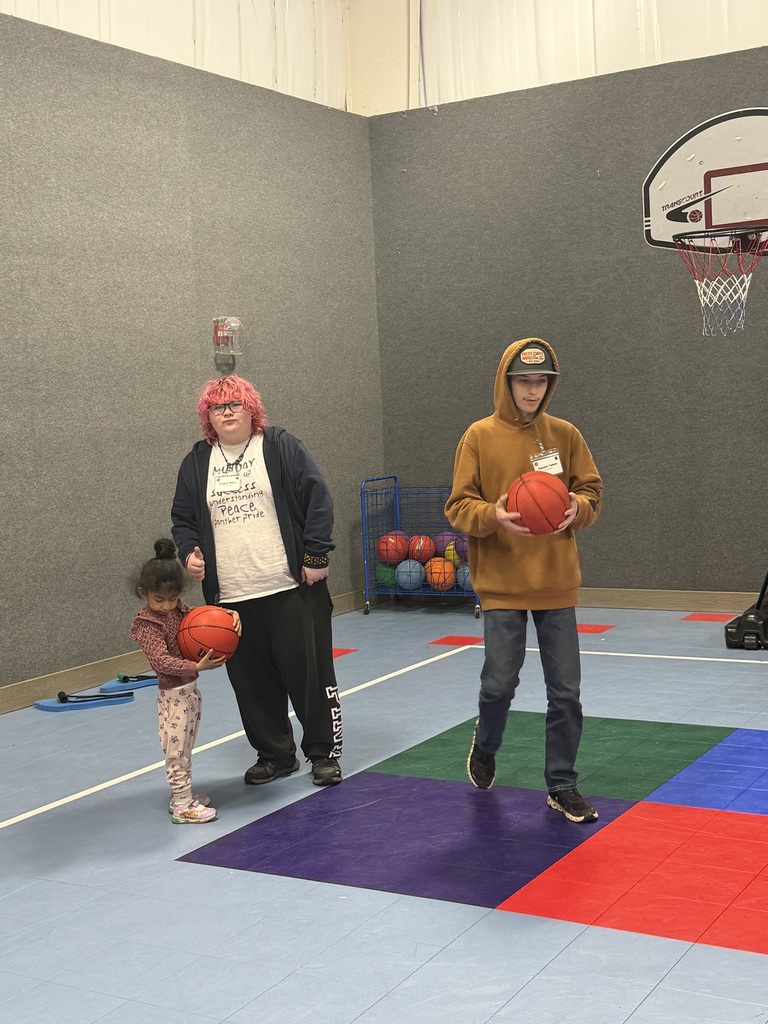 high school mentors with elementary students