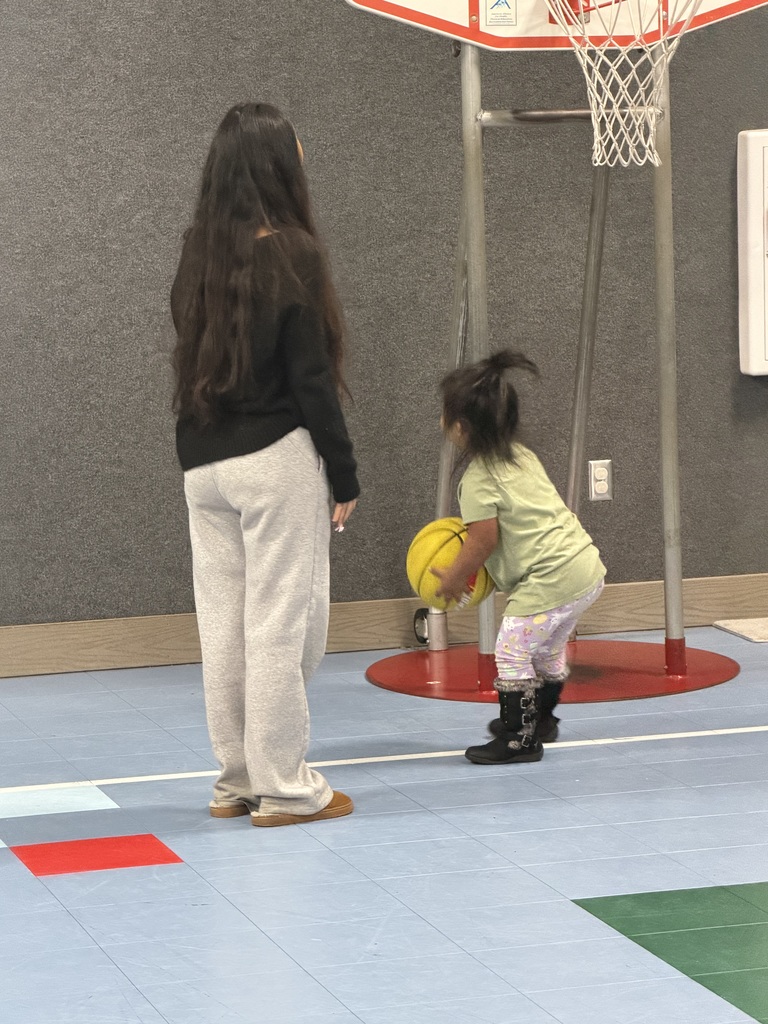 high school mentors with elementary students