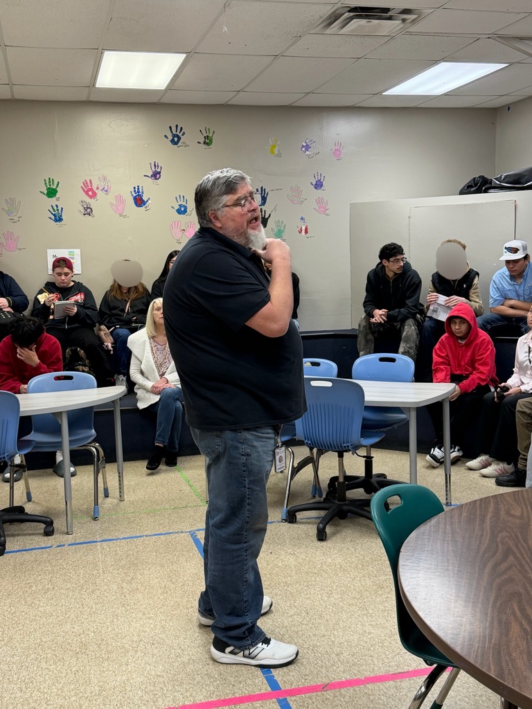 social studies teacher speaking about the Holocaust