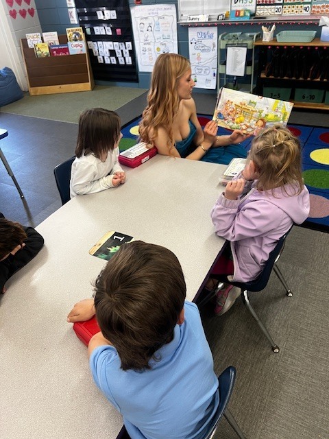 homecoming court with students