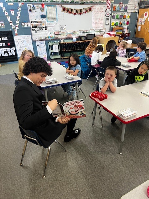 homecoming court with students