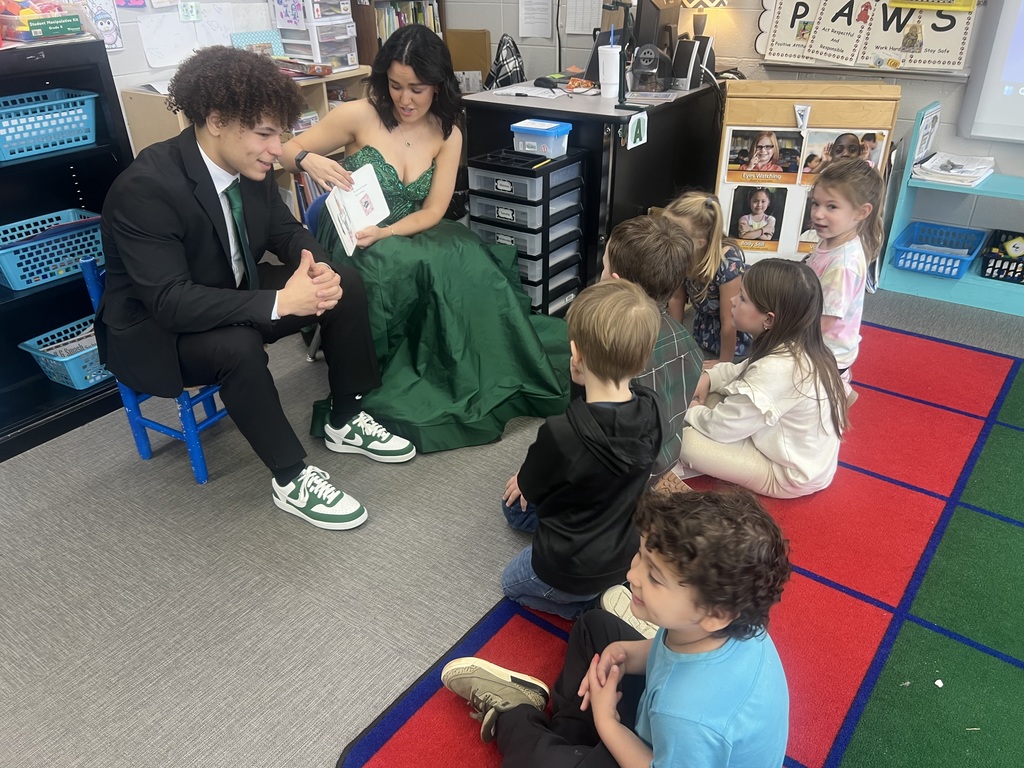 homecoming court with students