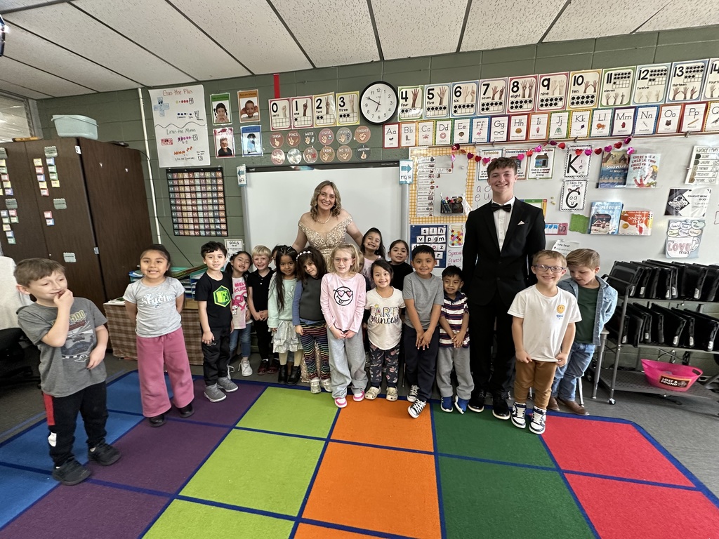 homecoming court with students