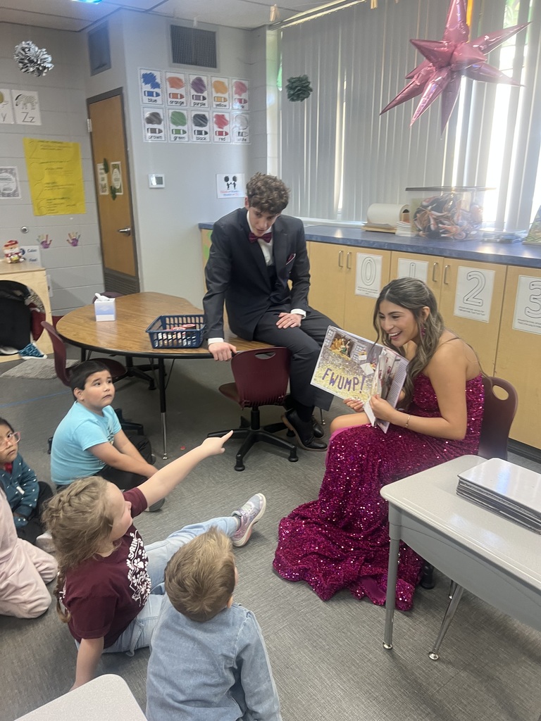homecoming court with students