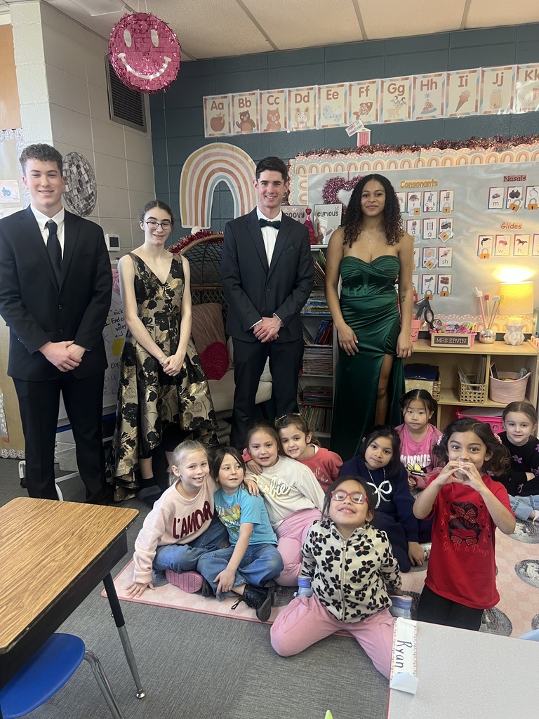 homecoming court with students