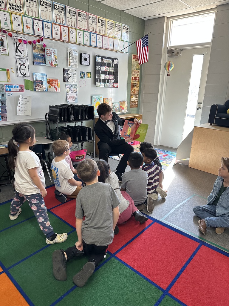 homecoming court with students