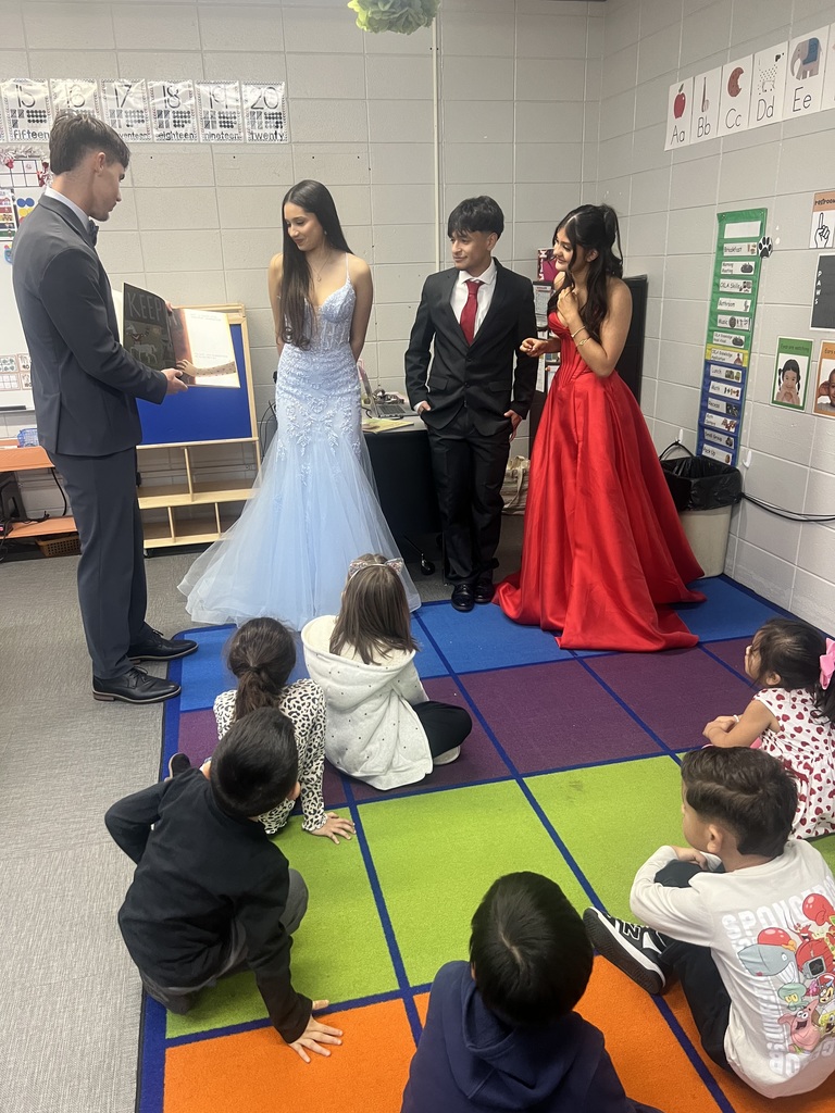 homecoming court with students