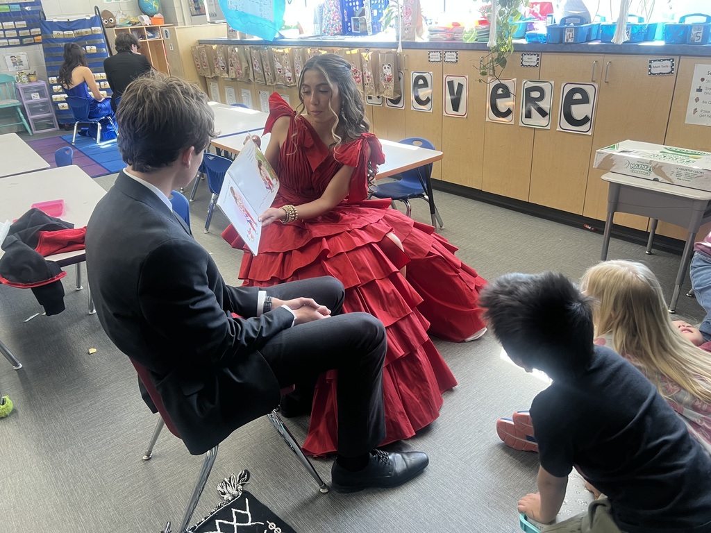 homecoming court with students