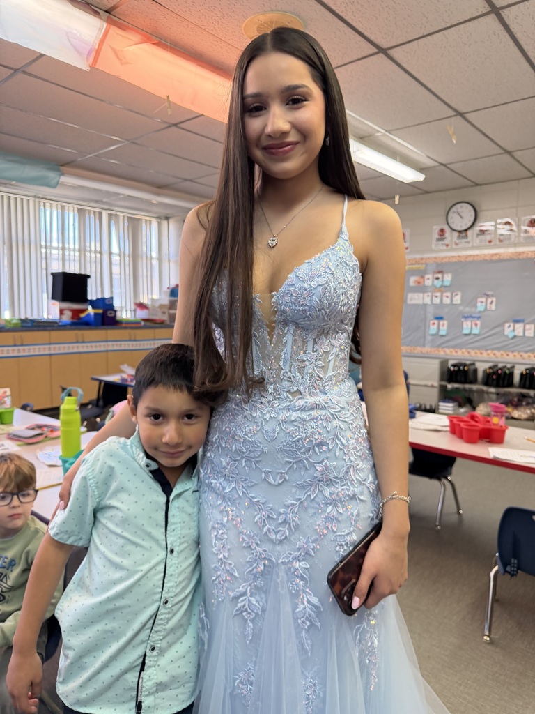 homecoming court with students