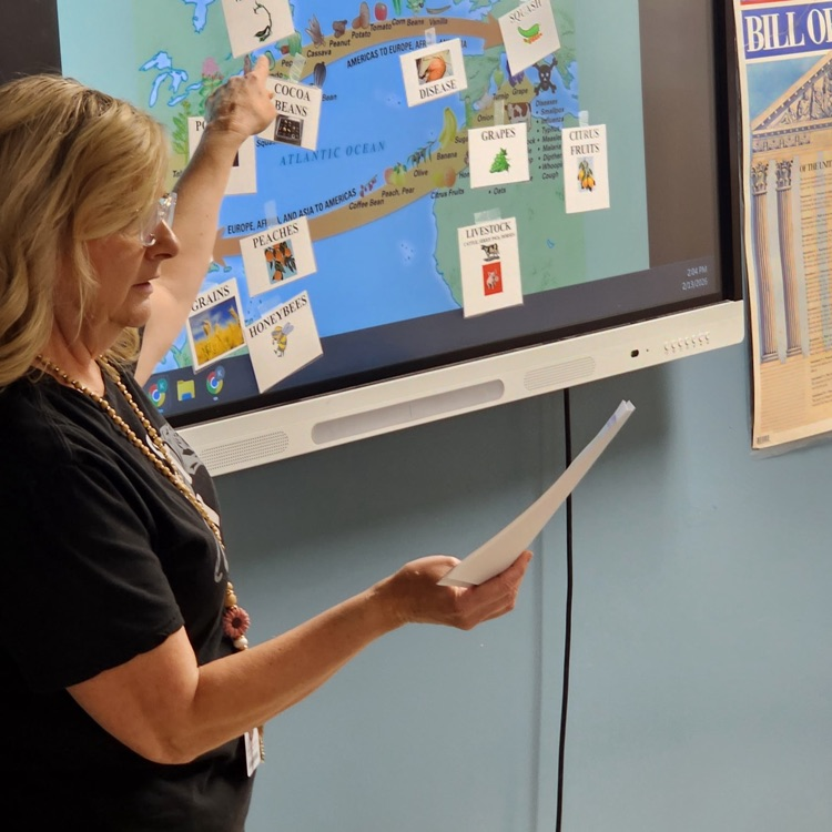 high school teacher leading a lesson