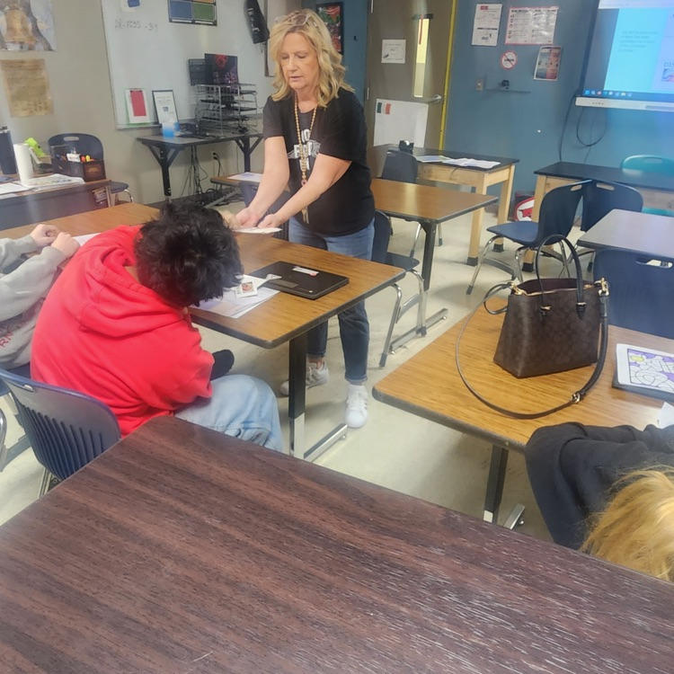 high school students working on a project