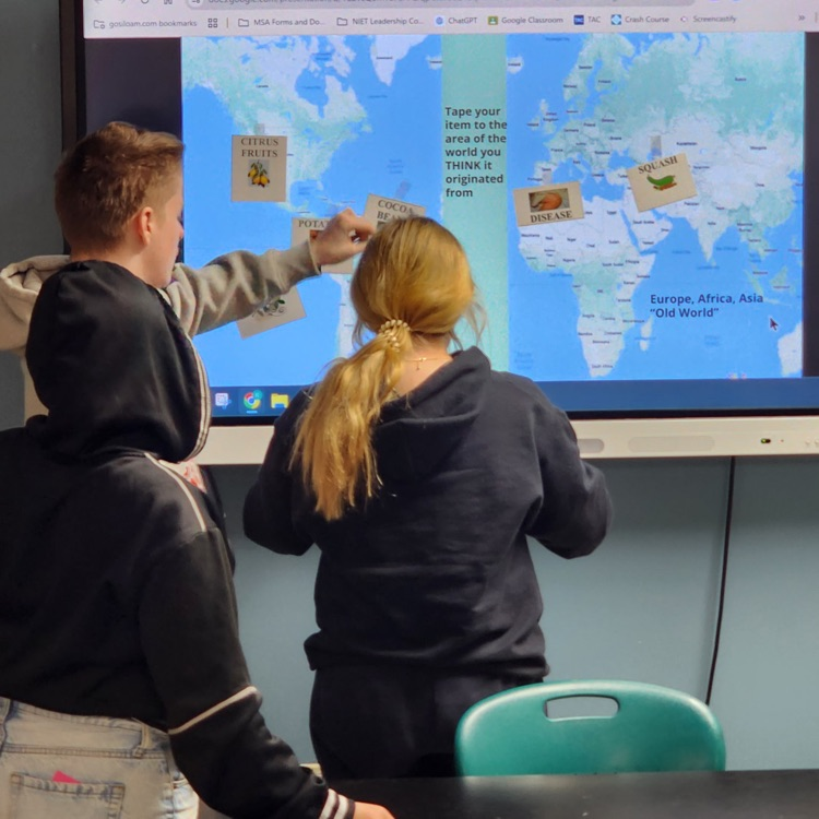 high school students working on a project