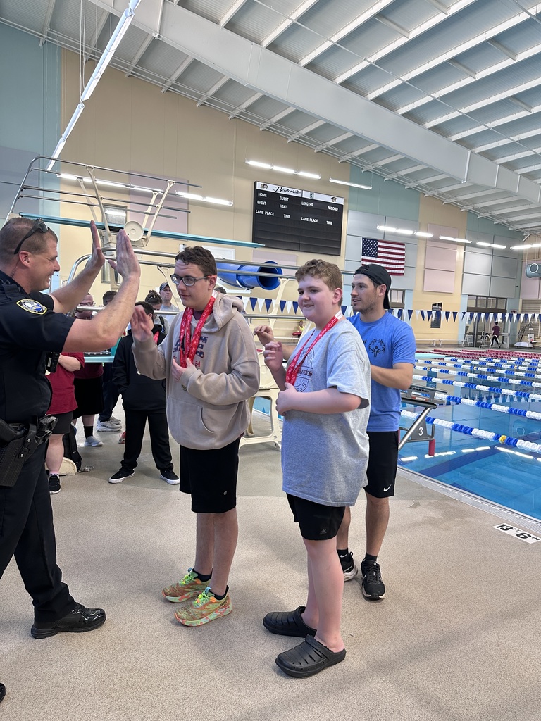 student receiving medal