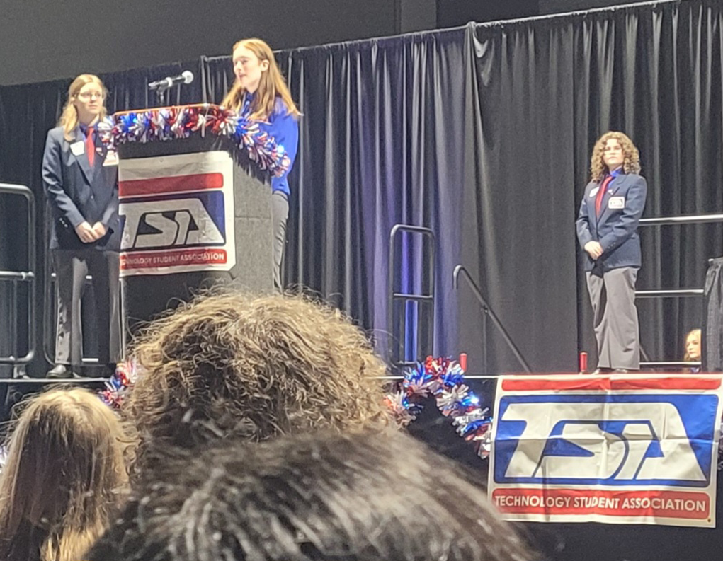 student speaking at conference