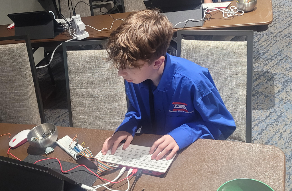 student working with technology