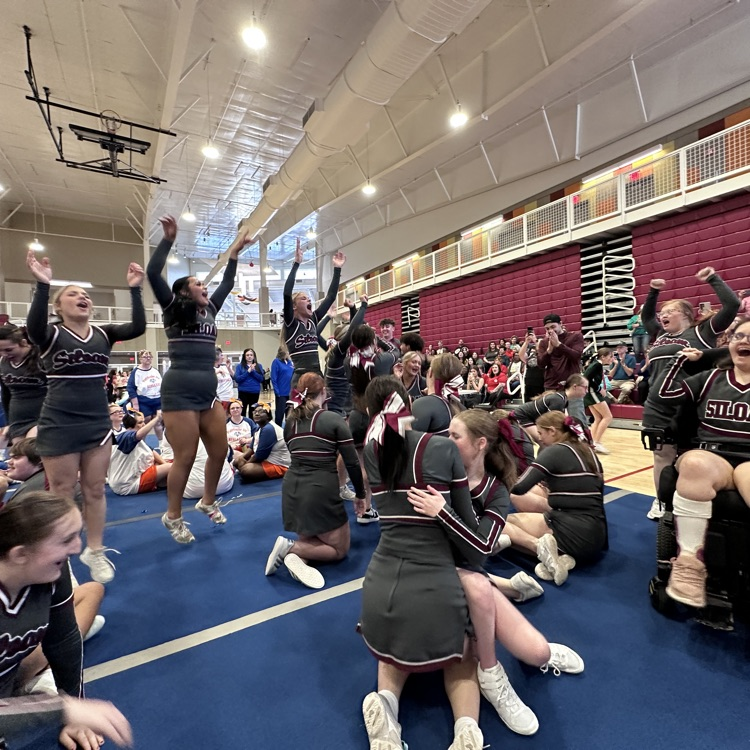 unified cheer team celebrating