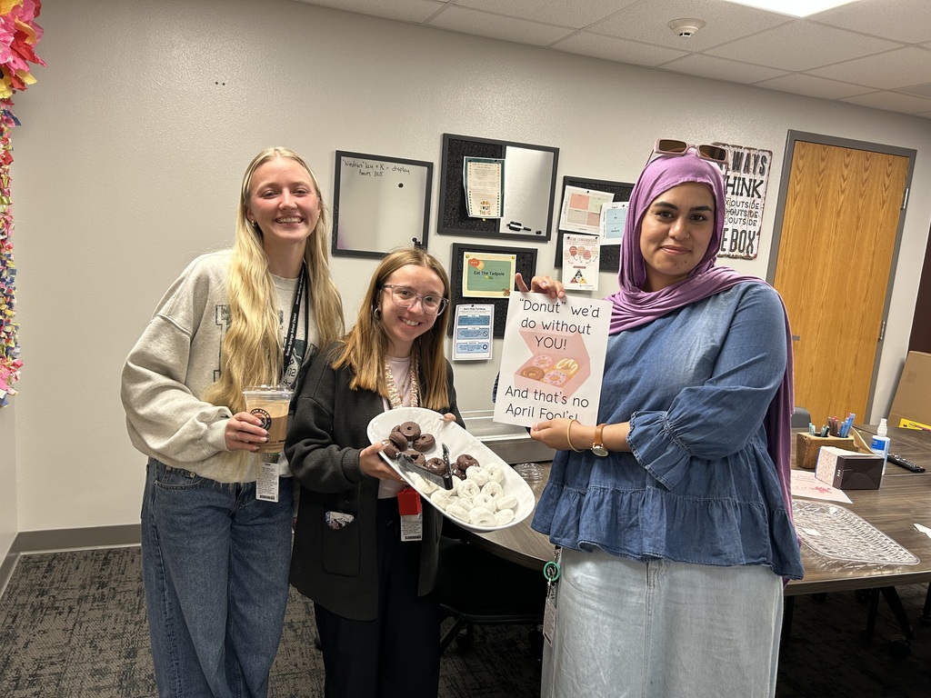 women with coffee and donuts