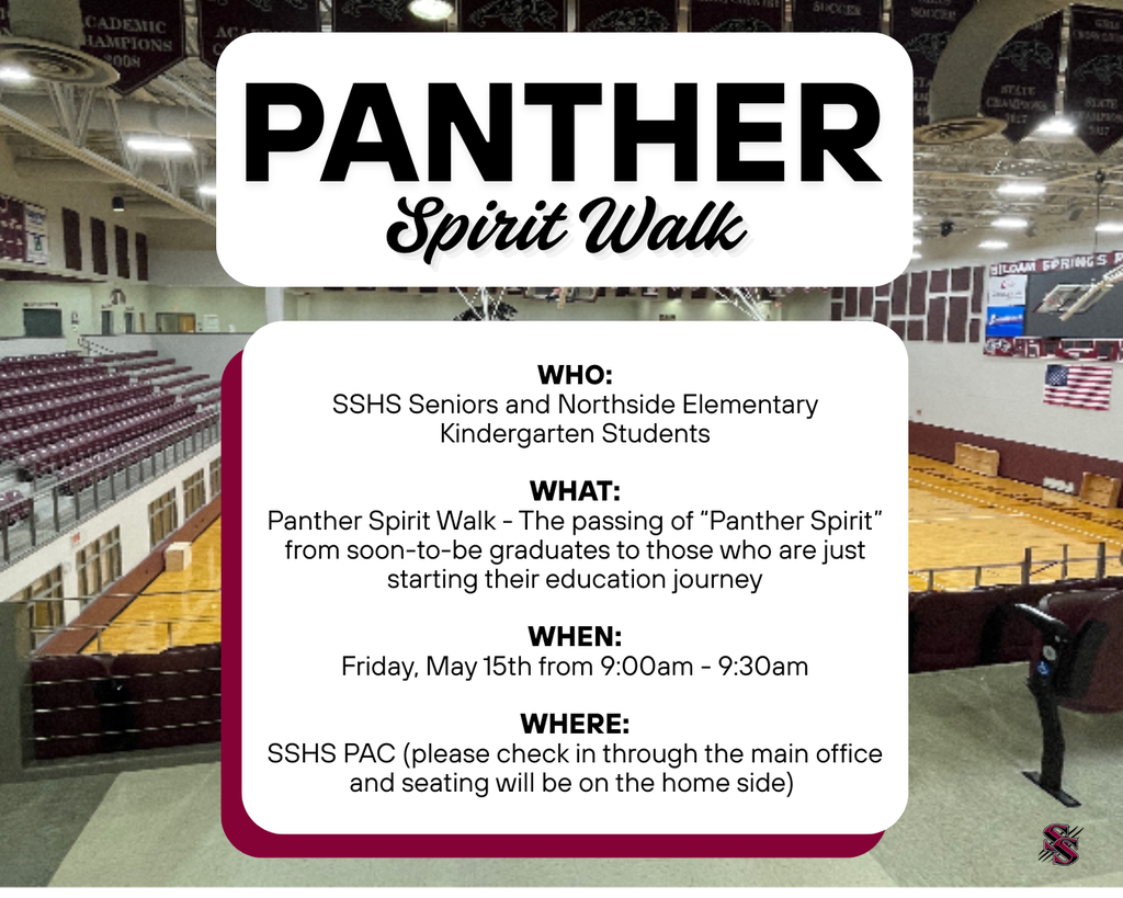 An indoor sports court in a large facility with an announcement for Panther Spirit Walk for students.