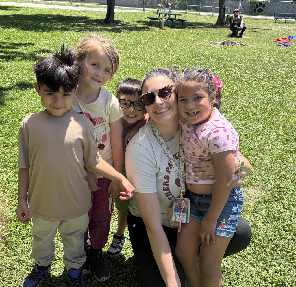 teacher with her students during field day