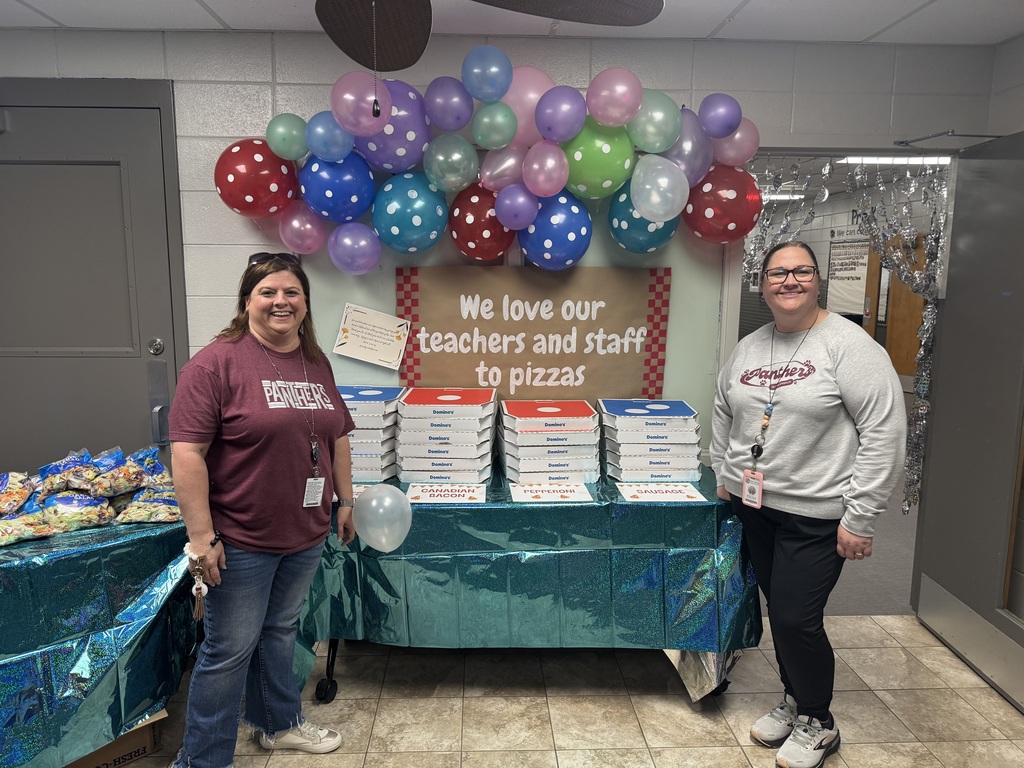 principal fox and principal taylor with boxes of pizzas