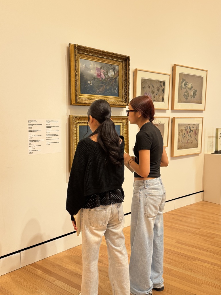 students observing works of art at Crystal Bridges