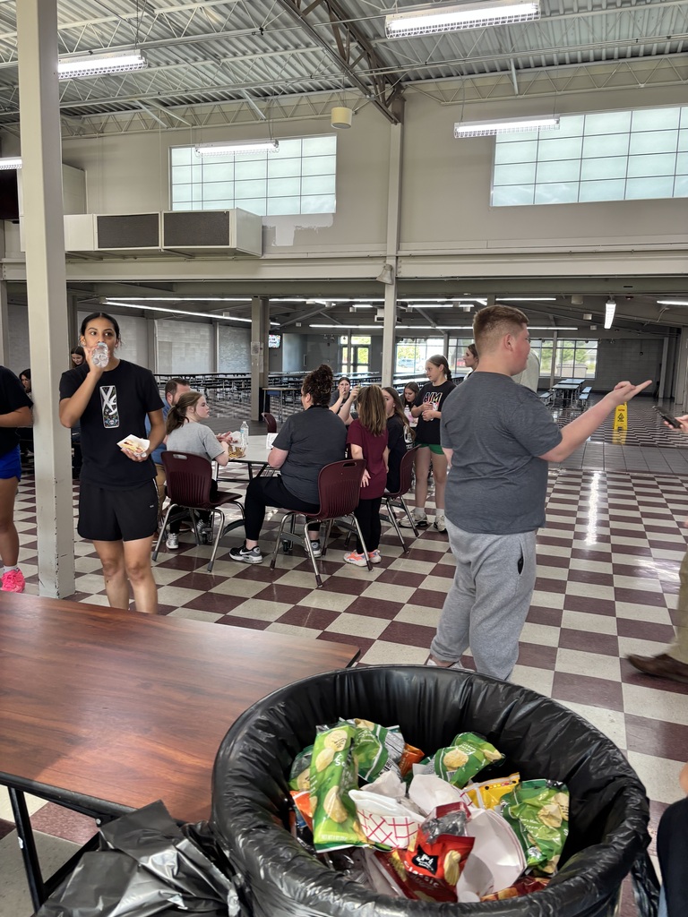 Students enjoying the hot dogs served during Steam night. 