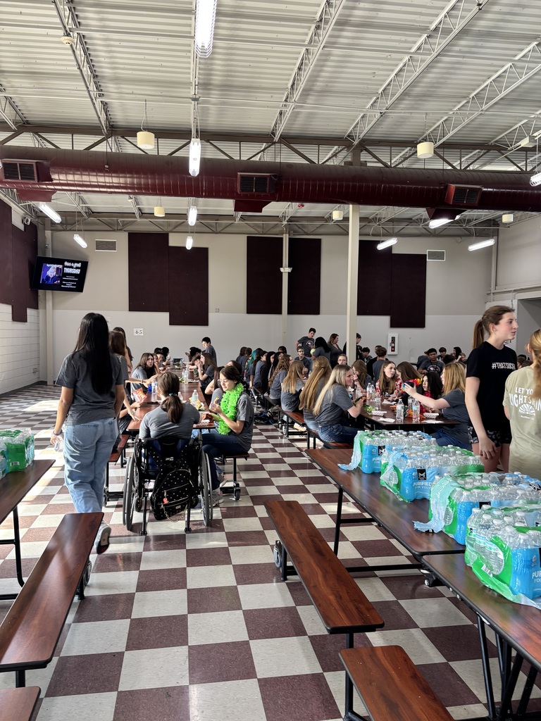 Students enjoying the hot dogs served during Steam night. 