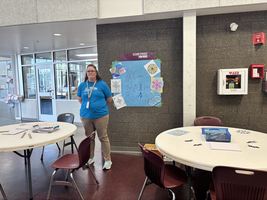 Students art created with math tools being displayed.