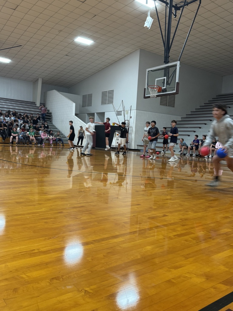 The group of students participating in the staff versus students volleyball game. 