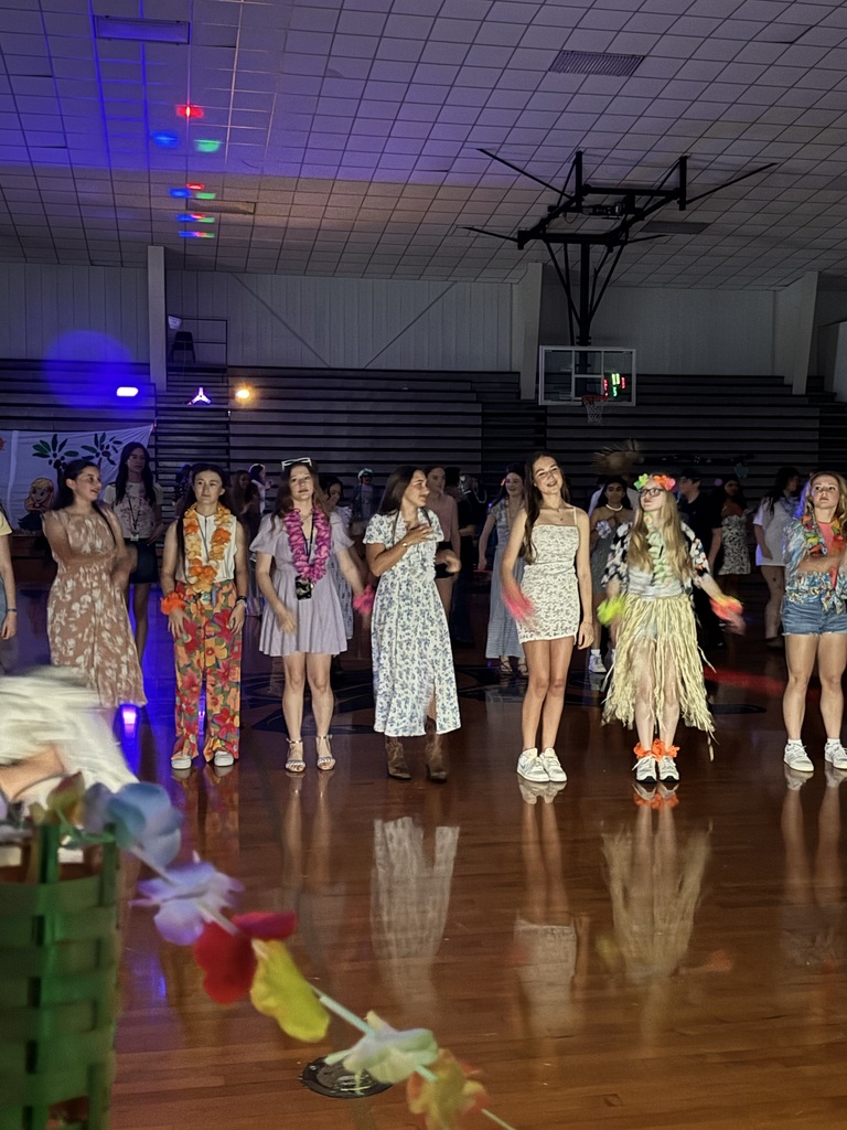 Students doing a line dance.
