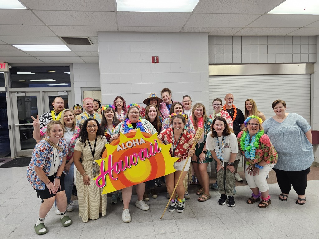 The group of teachers that volunteered and help put on the luau for the 8th graders. 