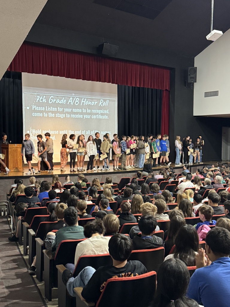 A group of 7th grad honor roll students. 