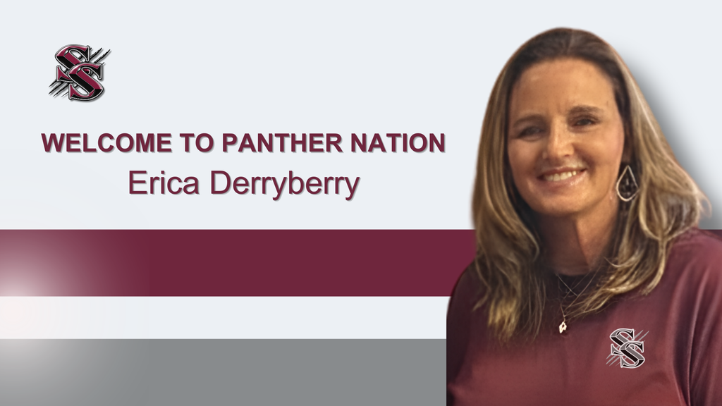 A woman in a maroon shirt stands smiling. Behind her, a white banner displays "WELCOME TO PANTHER NATION Erica Derryberry" with a logo.