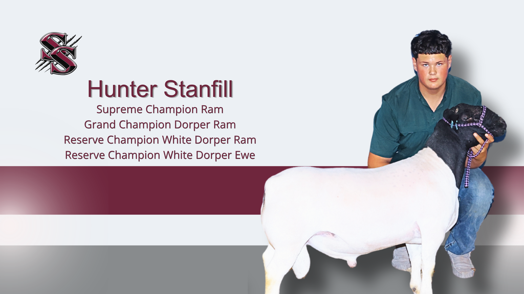 A student holds a white and black ram. He wears a green shirt and jeans. A logo is on a white background.