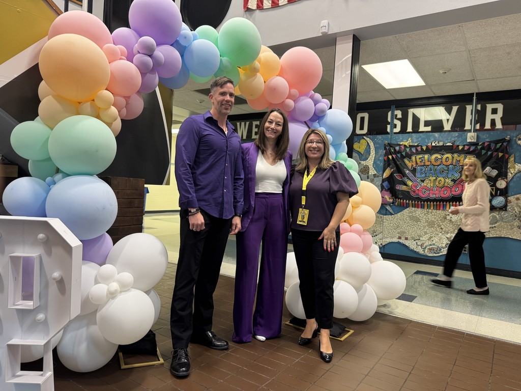 Staff in purple